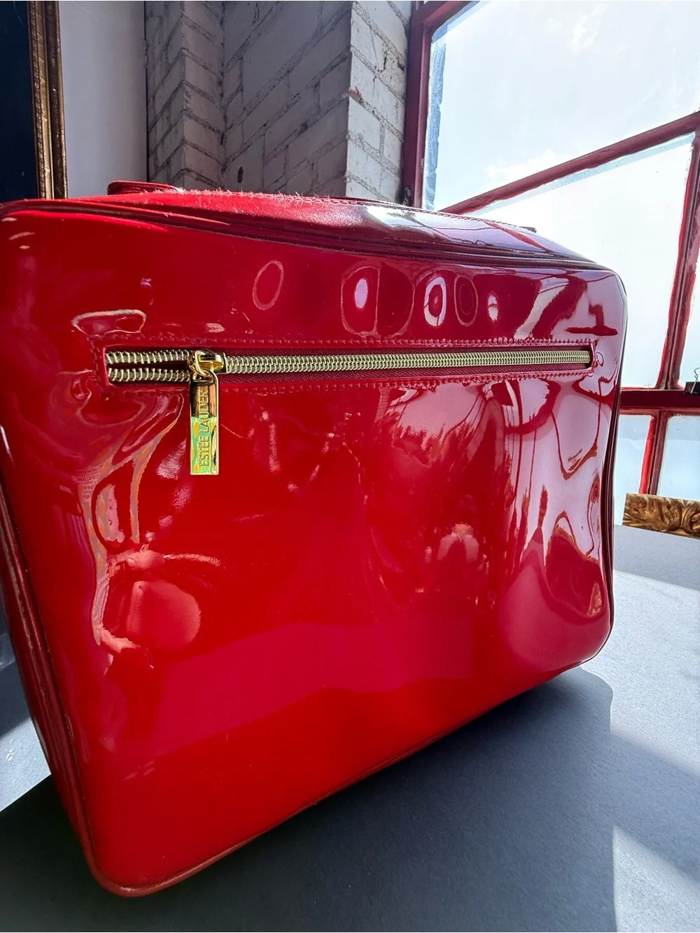 Estee Lauder Red Patent Cosmetic Case with Gold Zipper